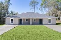 Building Photo - 9170 N Travis Dr