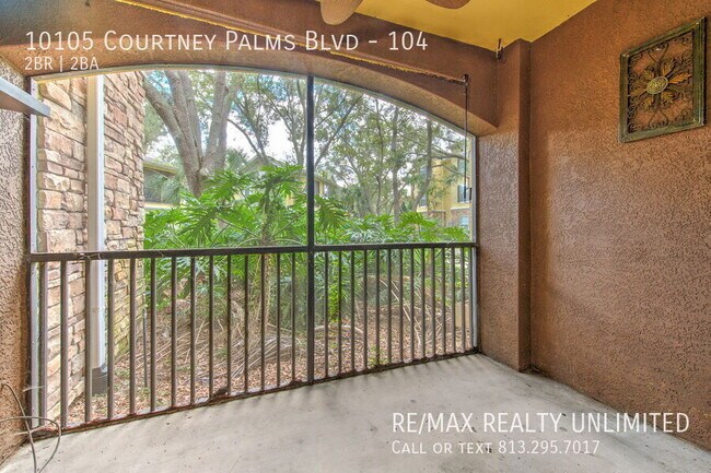 Building Photo - 10105 Courtney Palms Blvd