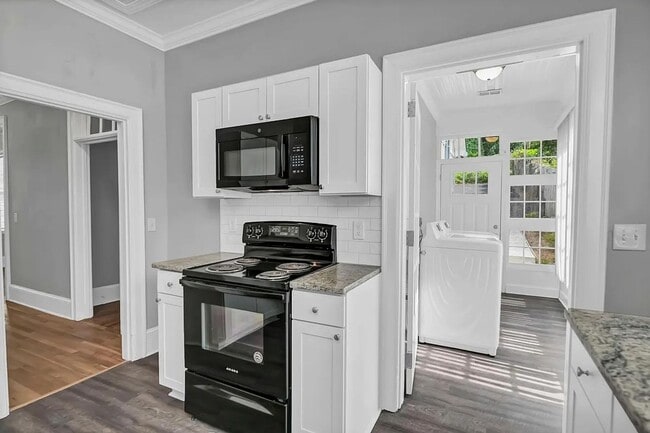 Building Photo - Beautifully renovated and repurposed house
