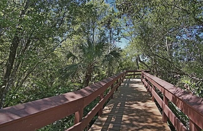 Elevated bridge to the cabana - 270 Naples Cove Dr