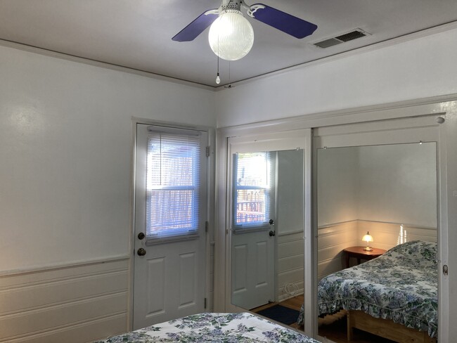 Back Bedroom with door to back deck. - 8046 Westlawn Ave