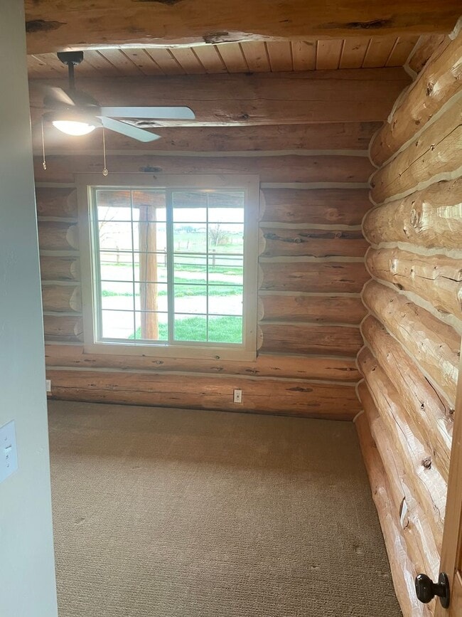 Building Photo - Charming Log Home For Rent with Large Shop & Spacious Yard
