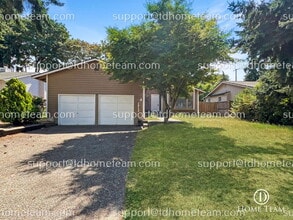 Building Photo - "Charming 3-Bedroom Retreat with Cozy Fire...