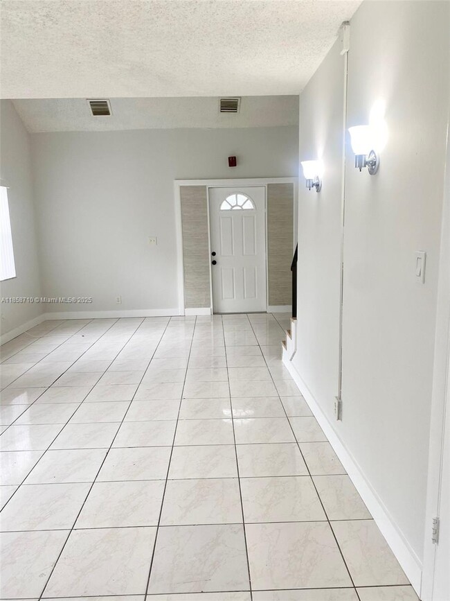 Building Photo - 3200 Coral Springs Dr