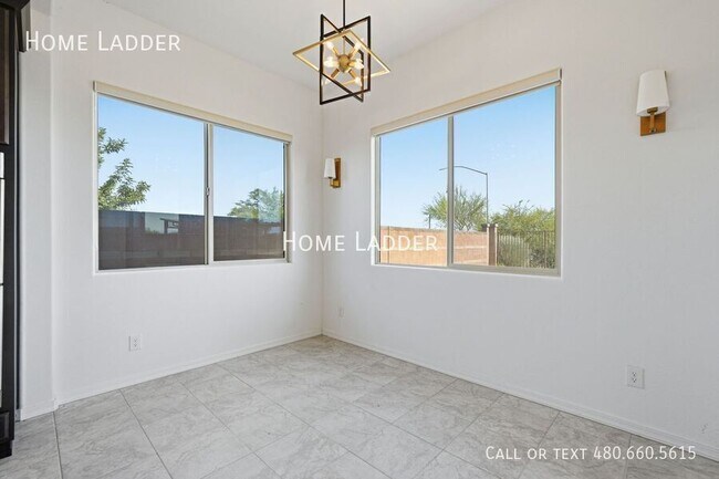Building Photo - 10812 E Tesla Ave