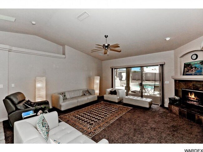 Building Photo - *REDUCED PRICE* Long Term - Unfurnished- Beautiful Golf Course Pool Home!!