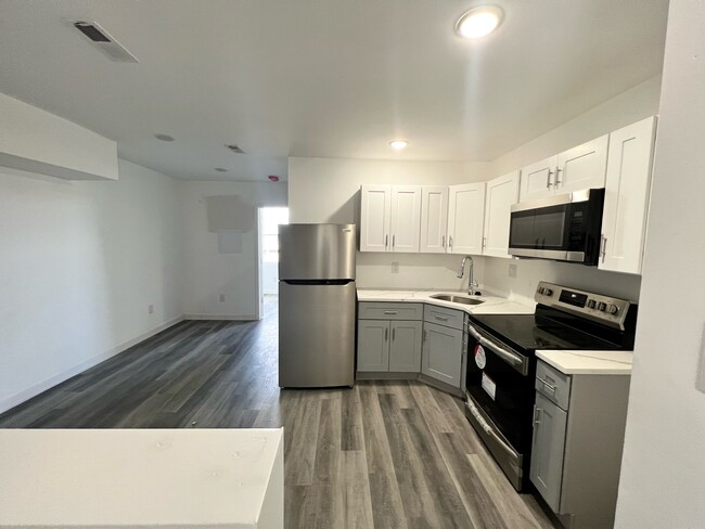 Kitchen/ Living room area - 2550 Kensington Ave