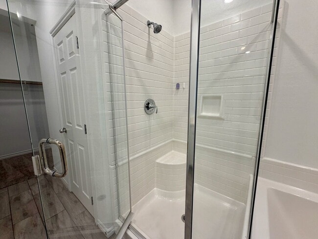 Building Photo - GATED 3 BED 2.5 BATH TOWNHOME WITH 2-CAR GARAGE, COVERED PATIO & COMMUNITY POOL