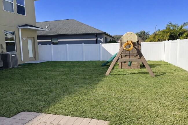 Building Photo - "Spacious 4-Bedroom Oasis with Modern Granite Touches in Land O' Lakes!"