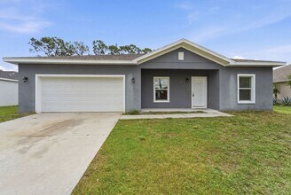 Building Photo - Modern New Construction 4BR/2BA Home for Rent in Palm Bay – Flexible No-Deposit Move-In Available