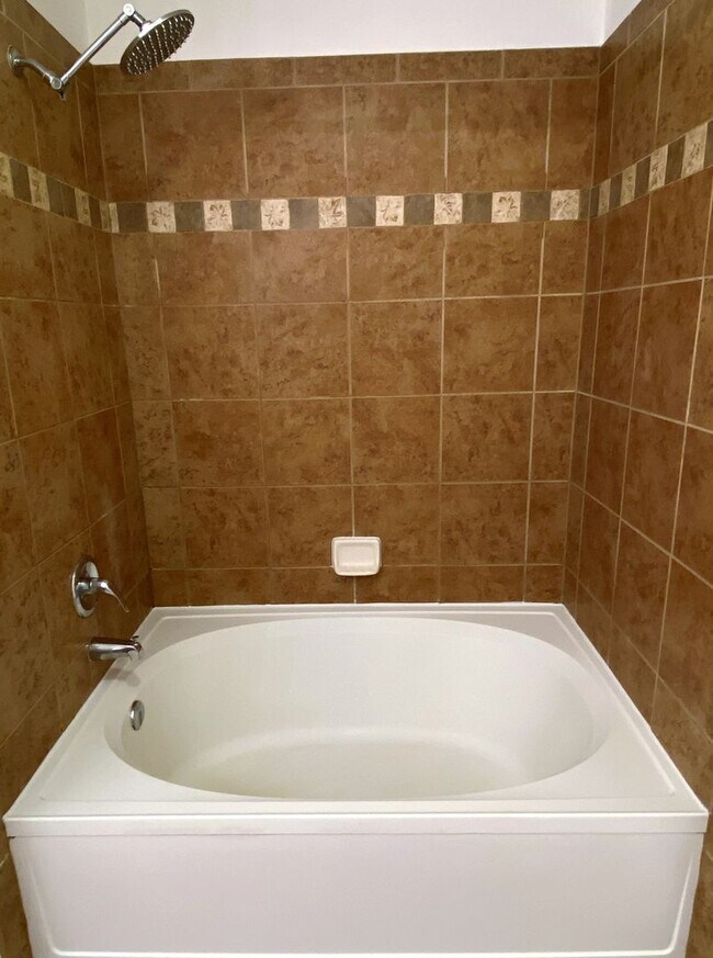 Building Photo - Stylish 1BD/1BA Condo with Garage & Balcony in Sought-After Englewood Location | $1,795/mo