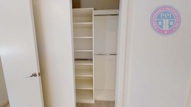 Building Photo - Riverfront Location, Luxury Townhome - End Corner Unit, Two En-Suites, Attached Garage