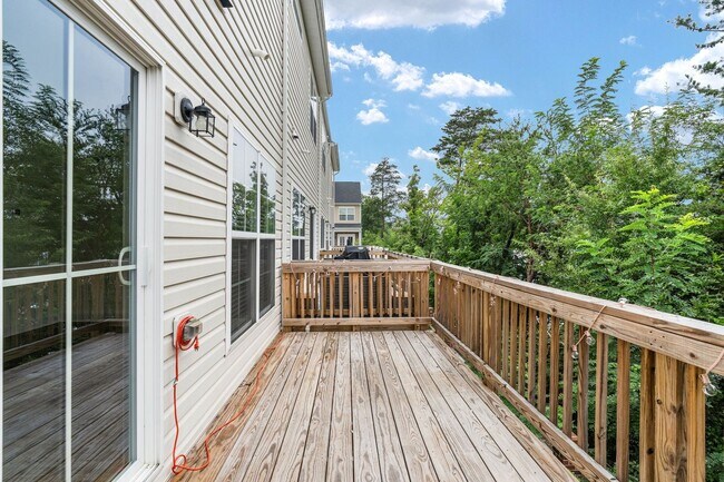 Building Photo - Your Next Home: Modern 3-Level Townhome with Garage, Deck & Huge Flex Space