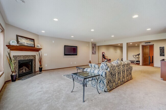 Building Photo - Grand 5 bed 4.5 bath Maple Grove Home w/ 3-Car Garage! Fully Furnished