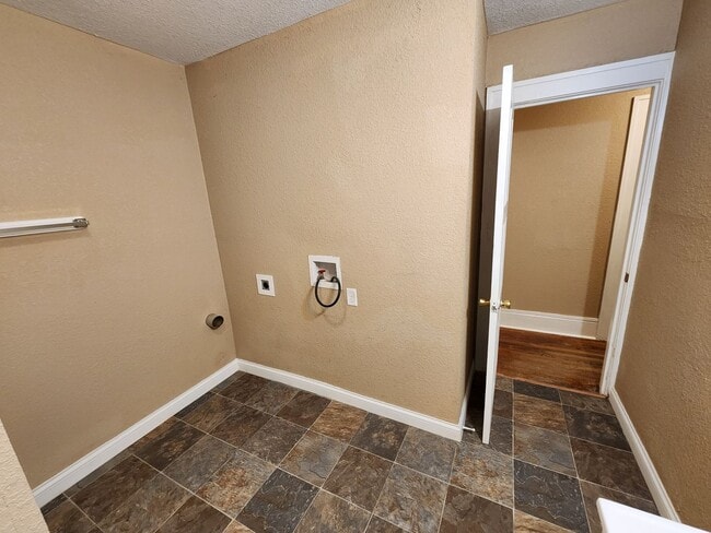 Building Photo - 4 Bedroom, 2 Bathroom home with large yard...