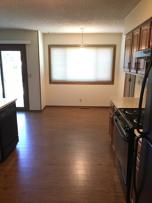 Building Photo - 7511 E 24th Ct N