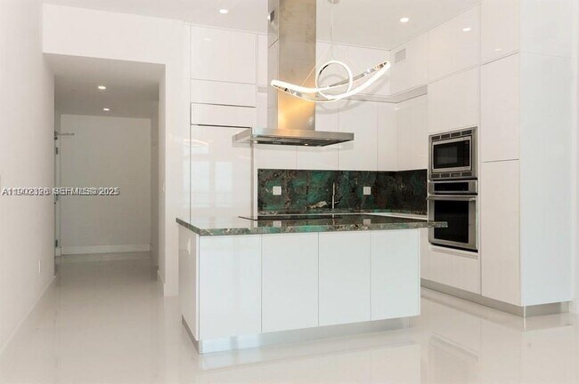 Building Photo - 6799 Collins Ave