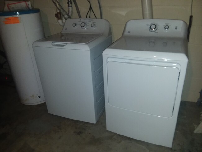 Washer and dryer in basement. Purchased in 2018. - 1255 Culbert Dr