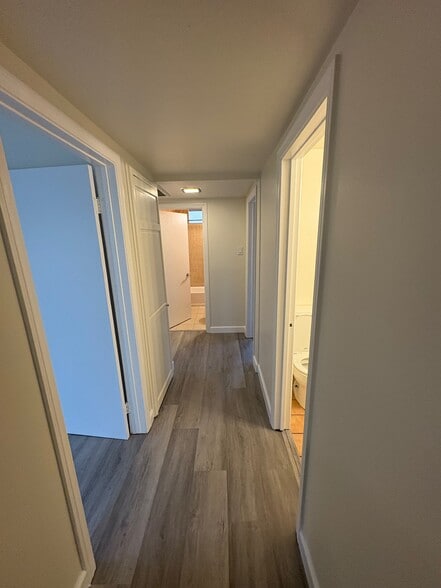 Central hallway, door on left is Master Bedroom, door on right is 3/4 bath , end of hall, full bath - 23162 Smith Rd