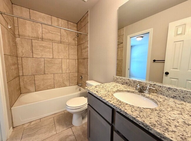 Building Photo - Corner Unit Townhome with 3 Bedrooms, Garage & Private Yard
