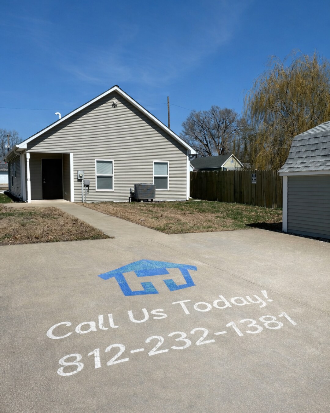 Back View / Concrete Parking Pad - 1309 3rd Ave