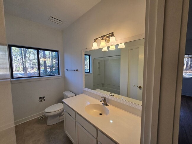 Building Photo - Multigenerational or Grad Student Living! Spacious One-Story End Unit in Prime Location on 54