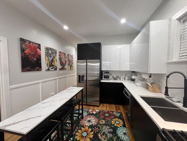 Building Photo - 6613 S Langley Ave