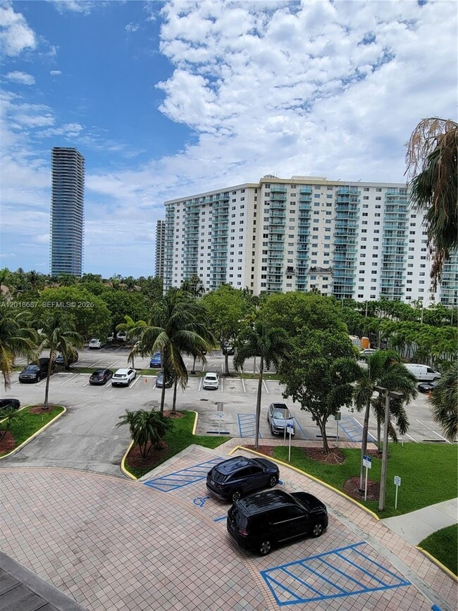 Building Photo - 19380 Collins Ave
