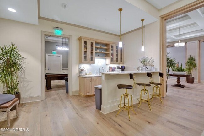 Building Photo - Welcome to your dream condo in the heart o...