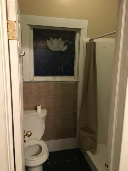 Bathroom toilet and shower - 1440 Oxford St