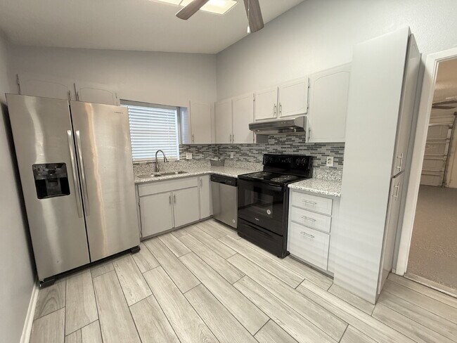 Building Photo - 8023 Wooden Dr