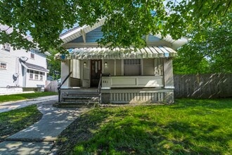 Building Photo - Charming 3BR Home with Classic Woodwork, Porch & Bonus Attic Space