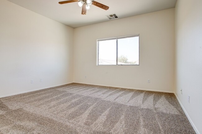 Building Photo - 4 Bedroom in Tolleson.  Landscaping redone.  Newer Carpet, Available February 1st!!!  Great 2 sto...