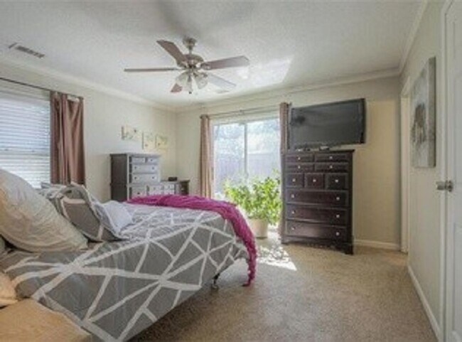 Building Photo - {5611} Updated OP Ranch + Two Car Garage + Fenced Yard and Stamped Concrete Patio Perfect for Spr...