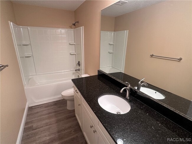 Building Photo - 7779 N Triana Dr