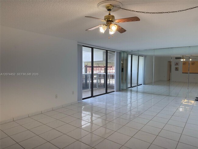 Building Photo - 3675 N Country Club Dr