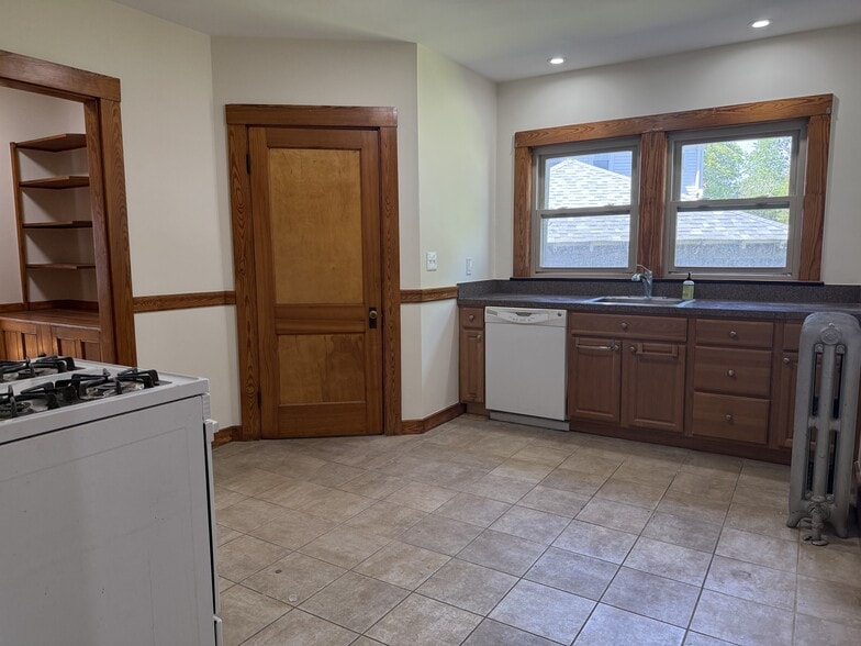 Kitchen (new range & fridge before move-in) - 585 High St