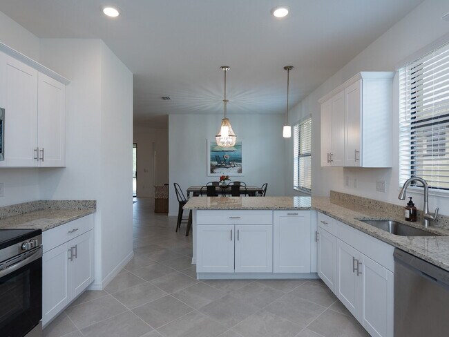 Building Photo - 3 Bedrooms | 2 Bathrooms | 2-Car Garage | Biscayne Landing – Gated Community