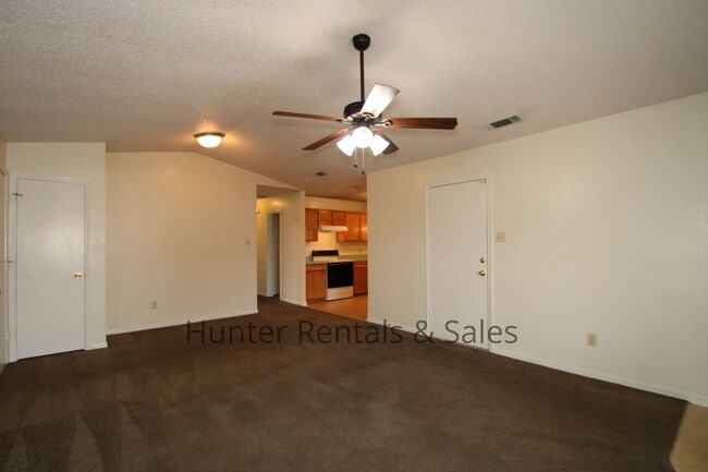 Building Photo - Move South!