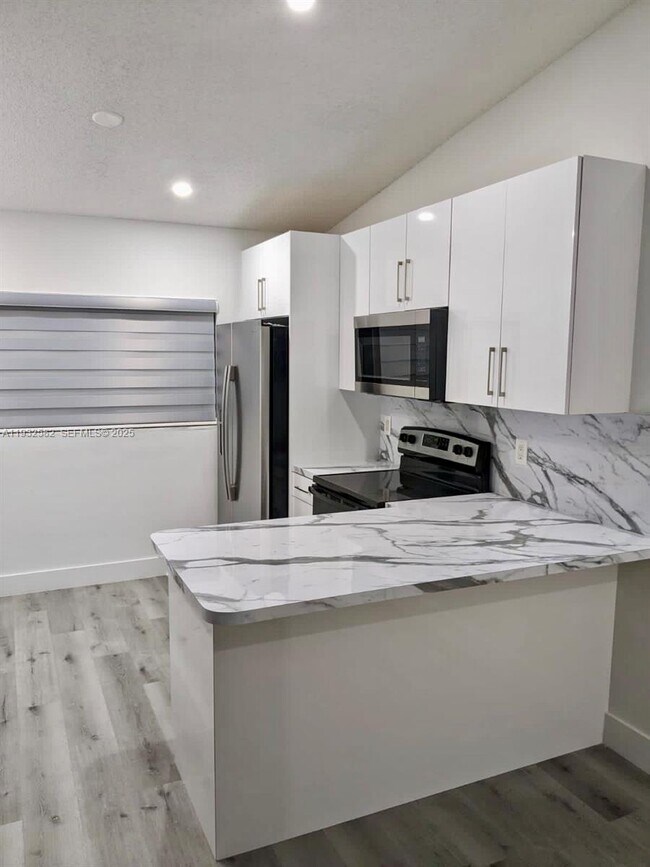 Building Photo - 7956 W 29th Ln