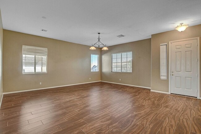 Building Photo - Gorgeous NW Single Story! 3 Car Garage! Serene Backyard.