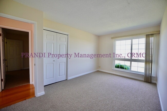 Building Photo - Serene Living on the Water’s Edge – Bright...