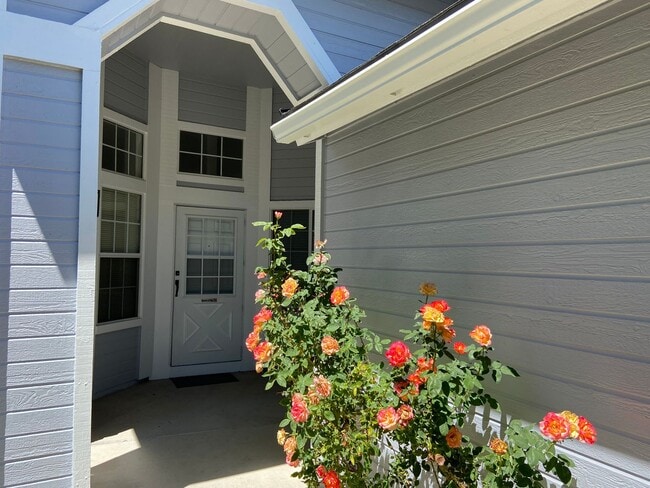 Building Photo - Coming Up Roses - NW Reno 4 Bedroom/3 Car Garage Single Story House
