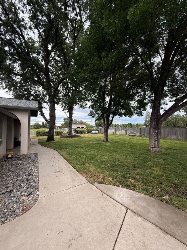 Building Photo - 3-bedroom, 2-bath home in Palo Cedro, situated on the golf course!
