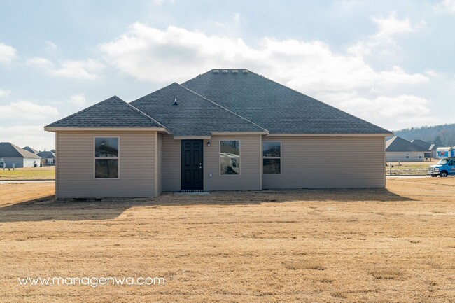 Building Photo - Cozy 4 Bedroom Elkins Home! Lots of upgrad...