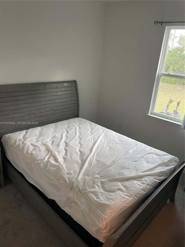 Building Photo - 6157 NW Gatun Dr