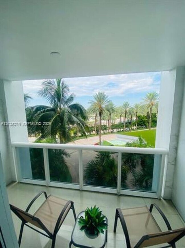 Building Photo - 10275 Collins Ave