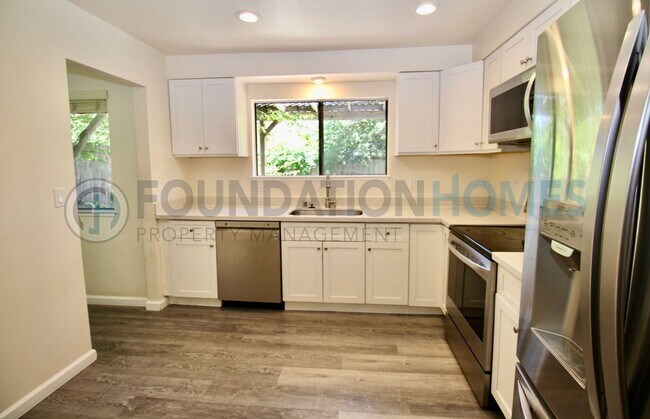 Building Photo - Renovated San Marin Townhouse | loft, A/C & 2-Car Garage - FOUNDATION