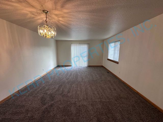 Building Photo - FREE RENT! Beautiful 1900 square foot 3 be...