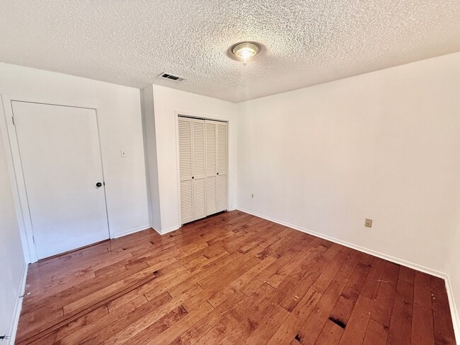 Building Photo - Charming 3BR/2BA Brick Home in Perkins Village – Spacious Yard & Cozy Fireplace